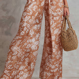 Athena – salopetă elegantă fără mâneci cu imprimeu floral și croi larg — imagine 4