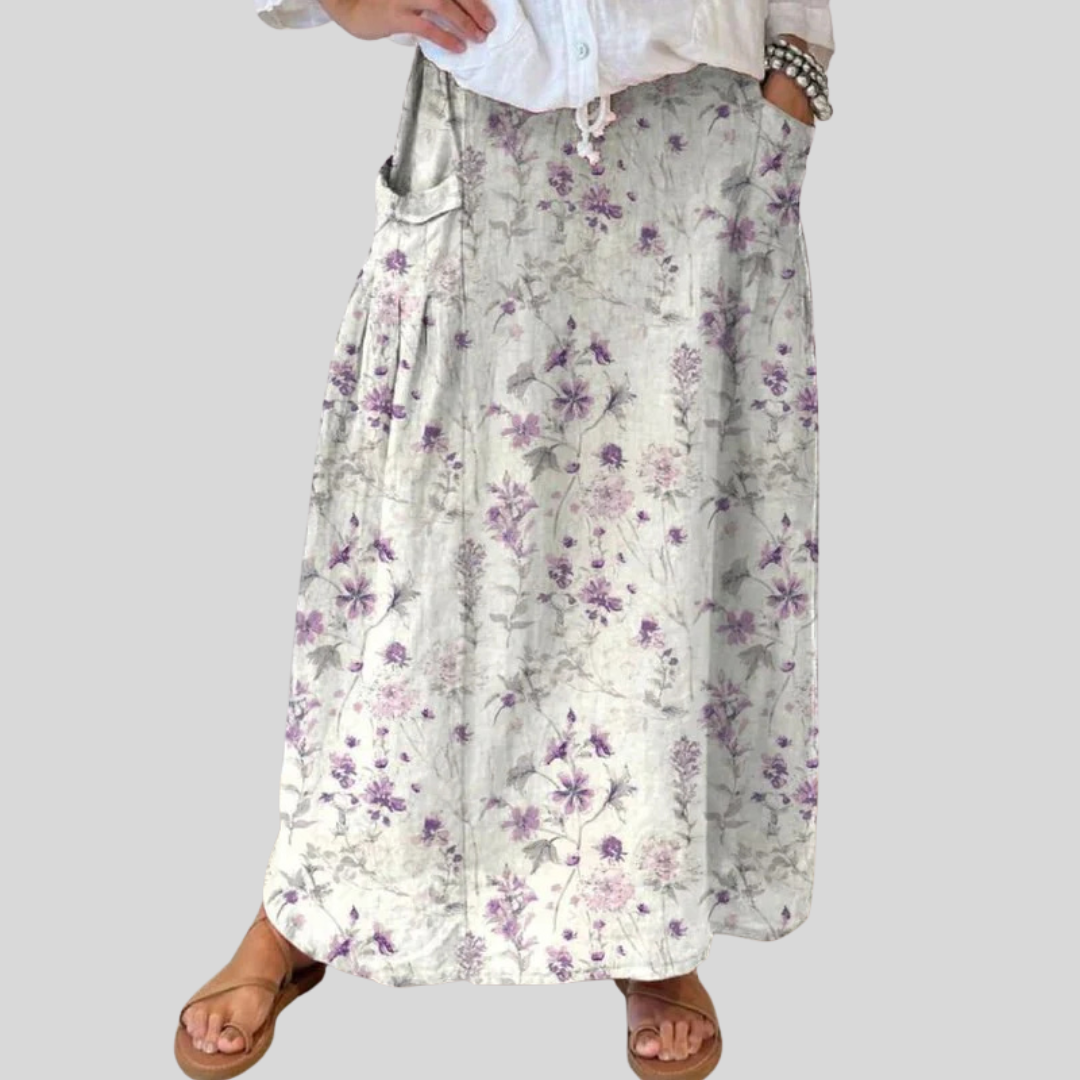 Fustă din pânză cu talie elastică și buzunare, model retro cu flori — imagine 1