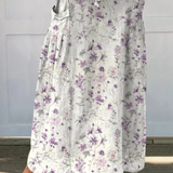Fustă din pânză cu talie elastică și buzunare, model retro cu flori — imagine 2