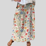 Fustă de in cu talie elastică și buzunare, model floral — imagine 1