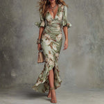 Rochie lungă asimetrică din satin Isabella verde, cu decolteu în V, mâneci bufante evazate și imprimeu floral — imagine 1
