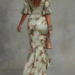 Rochie lungă asimetrică din satin Isabella verde, cu decolteu în V, mâneci bufante evazate și imprimeu floral — imagine 4